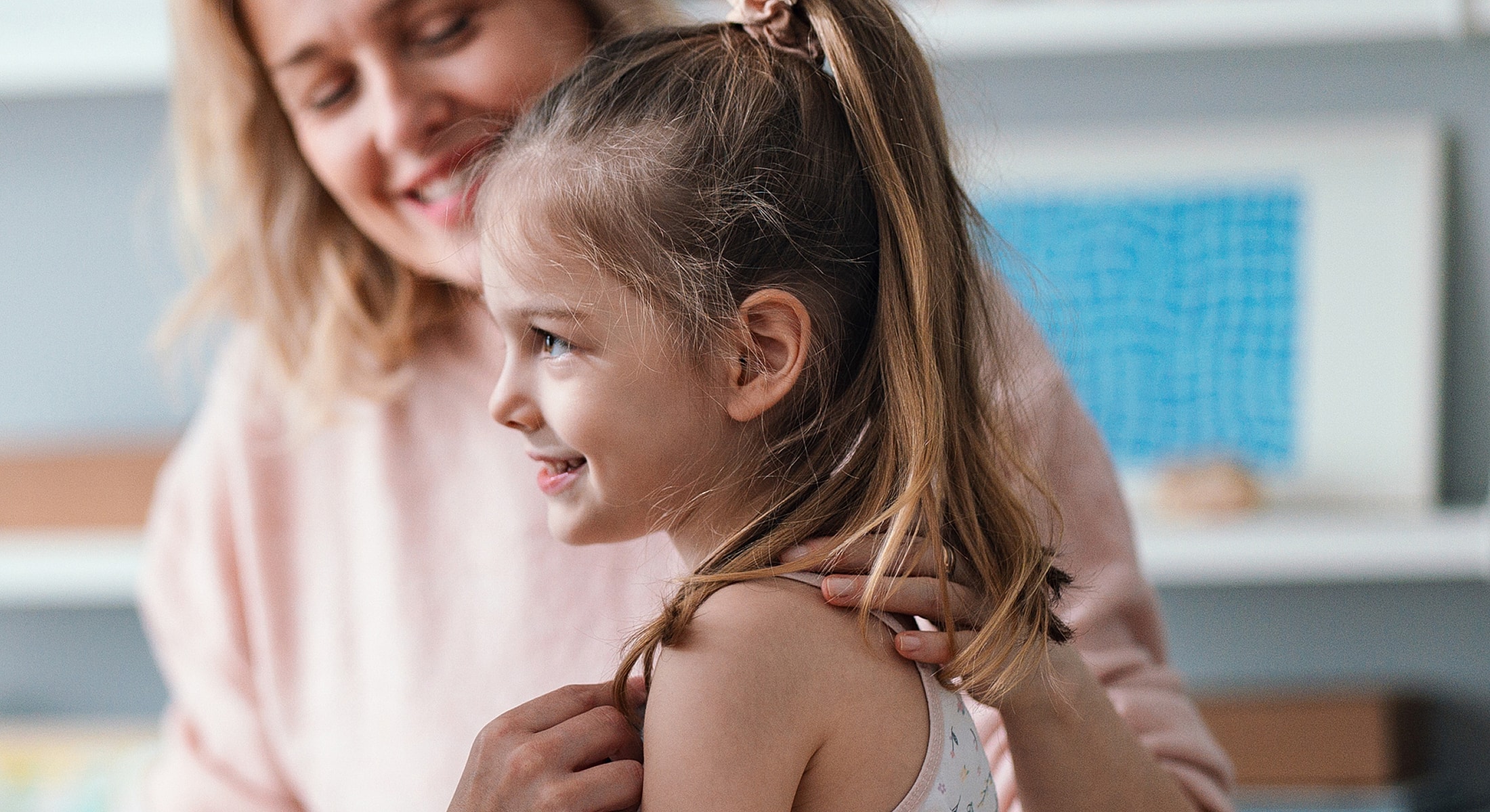 Mother and daughter sharing a joyful moment.